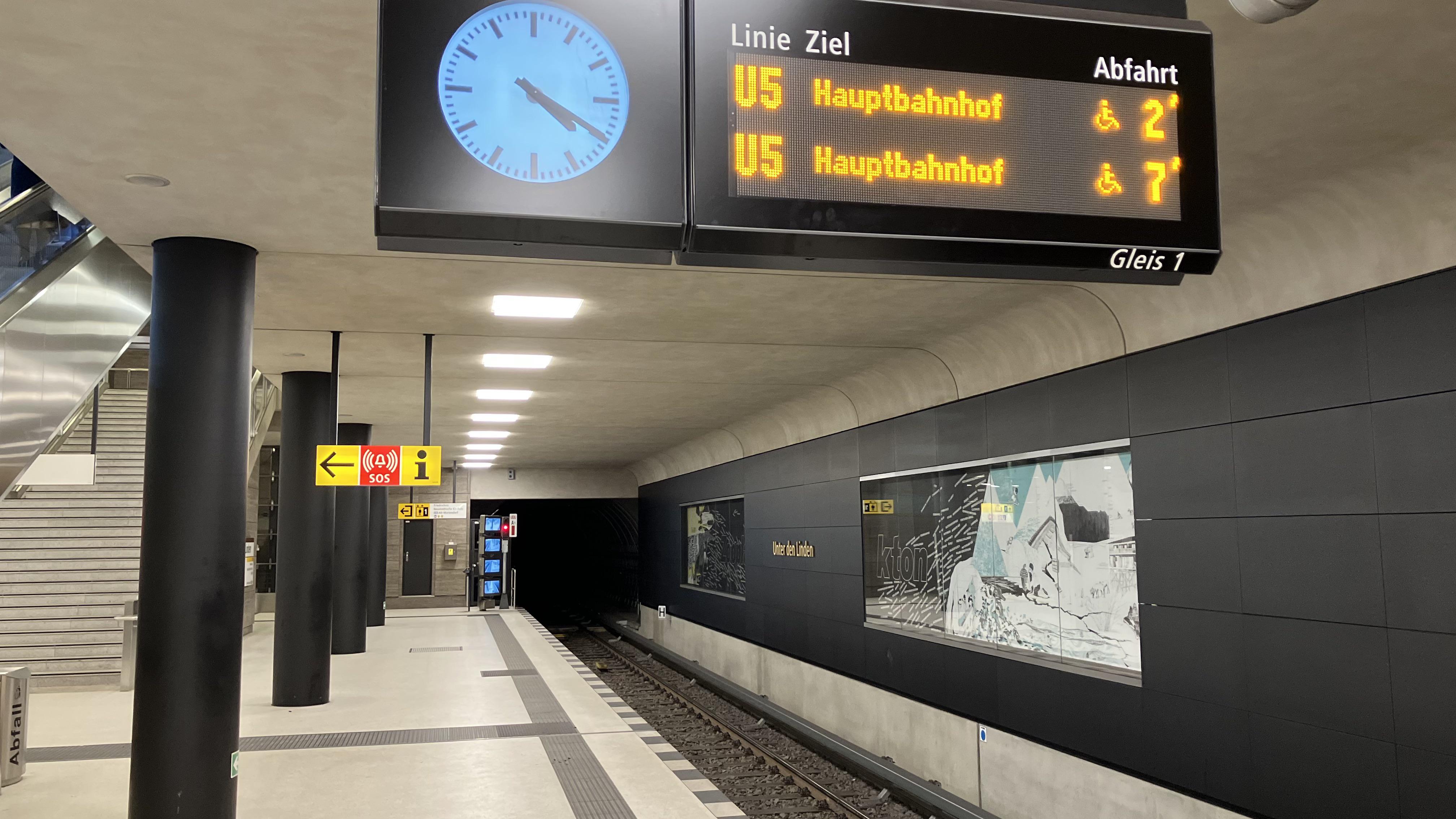 Transit departure board with clock
