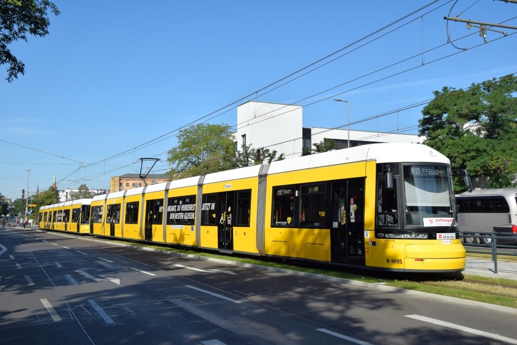 Yellow tram in a city street